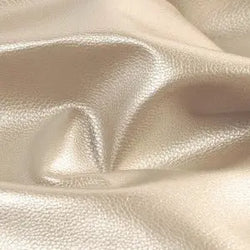 COUPON Simili KARLA STAR METALLIQUE 140X50CM-Mastic - La boite à tissus COUPON Simili KARLA STAR METALLIQUE 140X50CM-Mastic