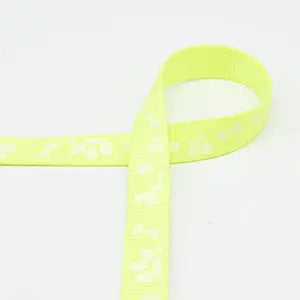 Sangle pattes et os de chien brillants jaune fluo 20mm - La boite à tissus