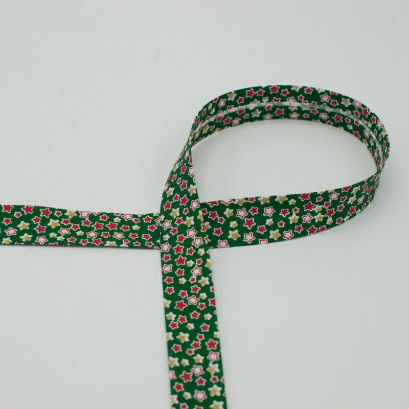 Biais étoiles Noël fond vert 18 mm - La boite à tissus