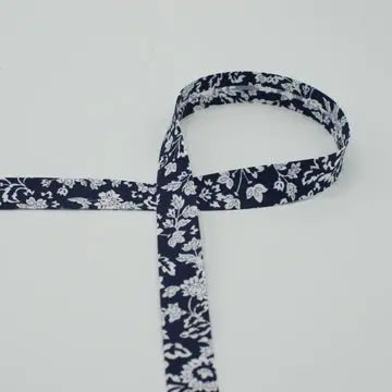 Biais fleurs fond noir 18 mm - La boite à tissus
