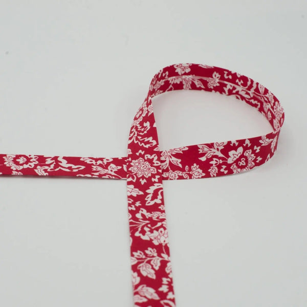 Biais fleurs fond rouge 18 mm - La boite à tissus