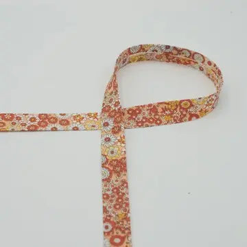 Biais floral organique orange claire 18 mm - La boite à tissus
